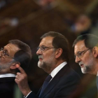 Multiexposición en cámara de la segunda intervención presidente del Gobierno, Mariano Rajoy, durante el pleno del Congreso en el que comparece para dar cuenta de la situación en Cataluña.