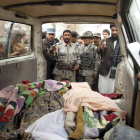 Cadáveres de los afganos que presuntamente fueron asesinados por un soldado de EE.UU.