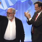 Cañete y Rajoy en el transcurso del acto del PP celebrado en Madrid.