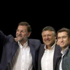Rajoy, Telmo Martín y Núnez Feijó, en la presentación del candidato del PP en Pontevedra.