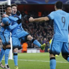 Messi ,Neymar y Suárez festejan el gol del argentino al Arsenal tras un sensacional contragolpe.