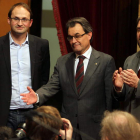 Joan Herrera, Artur Mas y Oriol Junqueras tras la votación en el Parlamento catalán.