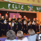 Felicitación navideña de la banda de Las Tres Caídas al finalizar el concierto benéfico.