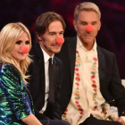 Heidi Klum, y los miembros del jurado del concurso 'Next Top Model', Thomas Hayo y Wolfgang Joop, poco antes de que el 'show' fuese suspendido por una amenaza de bomba.