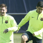 El argentino Leo Messi, a la izquierda, y Luis Suárez durante el entrenamiento del Barcelona