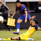Villa logra el primer gol del Barcelona ante la oposición del defensa Jorge Reyes.