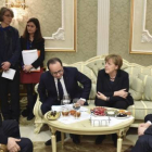 Vladimir Putin, Petró Poroshenko, Angela Merkel y François Hollande, en la cumbre de Minsk.