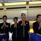 Cuatro azafatas transexuales de Air PC, en su primer vuelo.