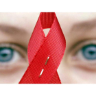 Un lazo rojo que simboliza la lucha contra la discriminación de los afectados por el sida.