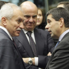 El chipriota Vassos Shiarly, De Guindos y el luso Gaspar.