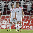 Mario Ortiz, Yeray González, Josep Señé e Iván González muestran su rostro agrio tras encajar el primer gol ante el Sporting. MARCIANO PÉREZ