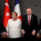 De izquierda a derecha_el presidente ruso, Vladimir Putin, la cancillera alemana, Angela Merkel, y los presidente turco, Recep Tayyip Erdogan, y el francés, Emmanuel Macron