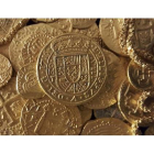 Algunas de las monedas del tesoro encontrado por la familia Schmitt, en Florida.