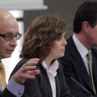 Montoro, Sáenz de Santamaría y Soria, tras el Consejo de Ministros de ayer.