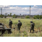 Militares rusos en territorio de Mariupol antes del ataque a la región de Donetsk. SERGEI ILNITSKY