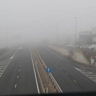 El polígono industrial de Trobajo del Camino esta mañana cubierto de niebla