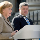 Angela Merkel junto a Petro Poroshenko ayer.