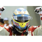 Fernando Alonso celebra eufórico un triunfo que le coloca segundo en el Mundial de F-1.