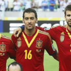 Arbeloa y Piqué, separados por Busquets, en una imagen de la selección del 2013.