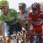 Valverde y Purito, con Contador (ausente este año), en medio, durante la Vuelta 2012.