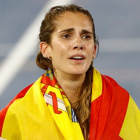 Marta García con la bandera de España tras lograr el bronce en el Europeo de Roma.