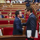 El presidente del Parlament, Josep Rull, este jueves en la Cámara autonómica, al inicio del debate de investidura del socialista Salvador Illa como nuevo presidente de la Generalitat, con el apoyo de PSC, ERC y Comuns, en plena incertidumbre por el regreso a Cataluña del expresident Carles Puigdemont, cuya detención podría llevar a la suspensión de la sesión parlamentaria.