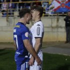 Dos jugadores durante el partido.