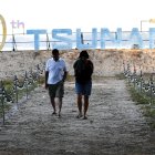 Takua Pa (Thailand), 26/12/2024.- German tsunami survivor from Aschaffenburg Claus Gerhart (L) and his wife visit a memorial park to commemorate the 20th anniversary of the 2004 tsunami at Tsunami Memorial Park in Ban Nam Khem, Phang Nga province, southern Thailand, 26 December 2024. Gerhart, 59, survived the 2004 tsunami, but he lost his youngest daughter and one friend in Thailand. Thailand commemorates the 20th anniversary of the 2004 Indian Ocean tsunami, which struck on 26 December 2004, triggered by a 9.2 magnitude earthquake in the Indian Ocean off the west coast of northern Sumatra, Indonesia. The tsunami claimed over 220,000 lives, internally displaced more than half a million people, and left hundreds of thousands without livelihoods, according to the United Nations, making it one of the deadliest natural disasters in history. Indonesia, Sri Lanka, India, the Maldives, and Thailand sustained massive damage from the catastrophe. (Terremoto/sismo, Maldivas, Tailandia) EFE/EPA/RUNGROJ YONGRIT