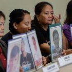 Familiares de víctimas de la guerra contra las drogas en Filipinas durante el mandato del expresidente Rodrigo Duterte 
                      EFE/EPA/ROLEX DELA PENA