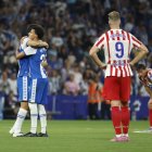 Los jugadores del Espanyol celebran la victoria después de remontar el gol inicial del Atlético.