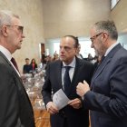 Mario Amilivia, entre Luis Gracia y Calos Pollán.