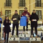 Villa en lo alto del podio masculino.