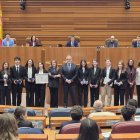 Los ganadores de la liga de debate con Lucas y Pollán.