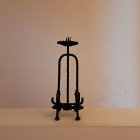 El candelero de mesa del mobiliario litúrgico de Gaudí para la Sagrada Familia.