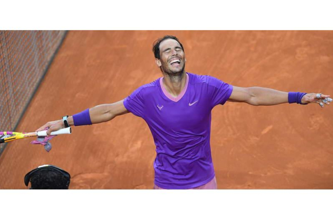 Nadal celebra su triunfo sobre Djokovic para conquistar un nuevo título en un Masters 1.000. Y uno más en el de Roma. FERRARI