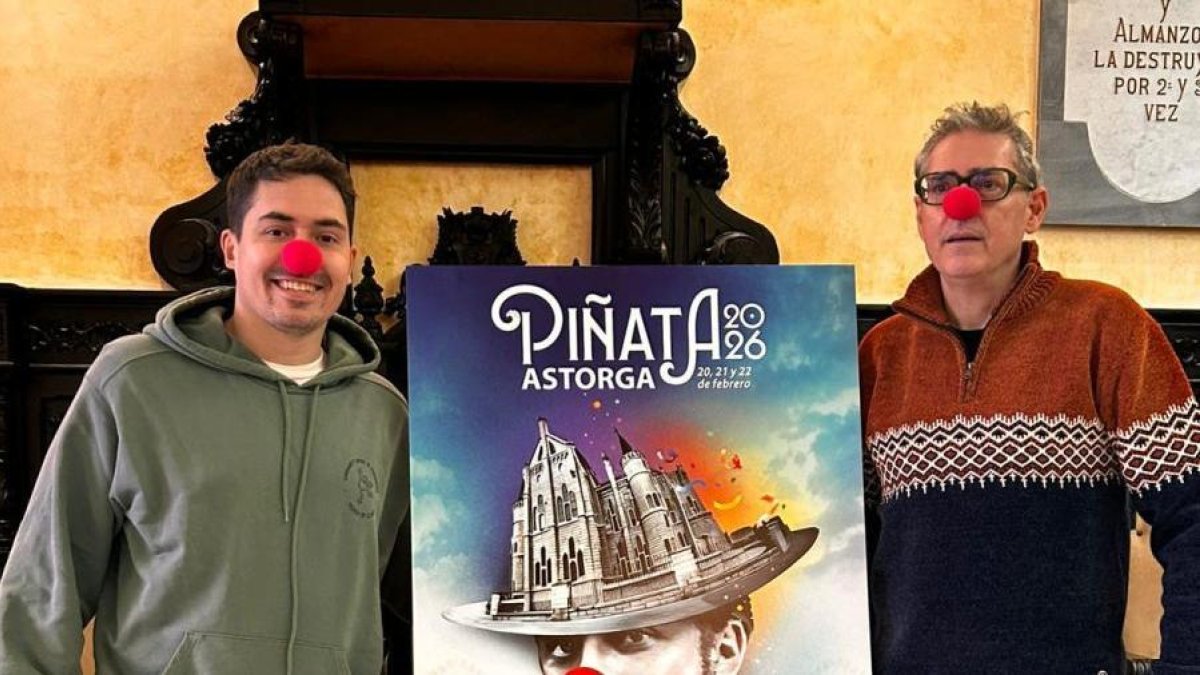 El concejal de fiestas junto al artista del cartel.