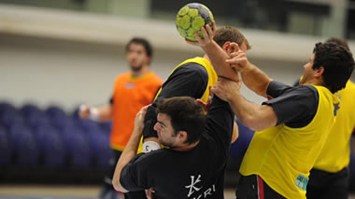 El pivote Andreu, Chernov y Castresana, durante un entrenamiento.