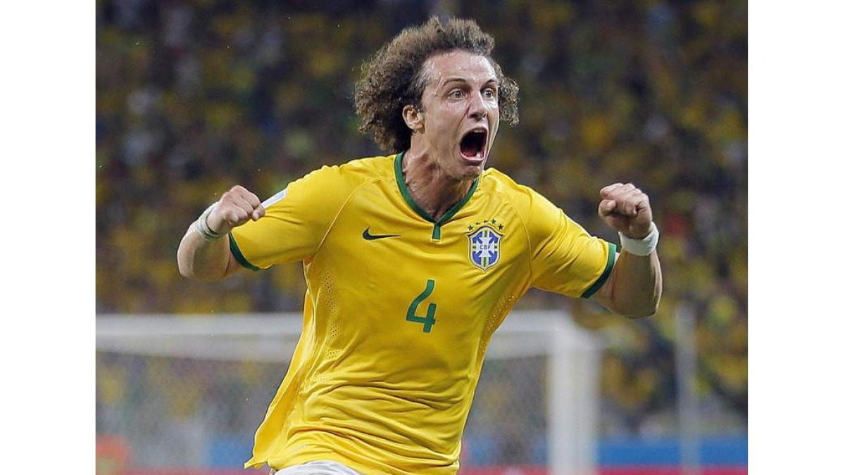 El rostro de David Luiz refleja la apoteosis brasileña tras el segundo gol a Colombia.