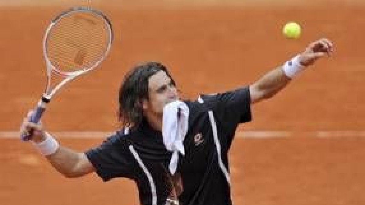 David Ferrer celebra su victoria ante el australiano Lleyton Hewitt