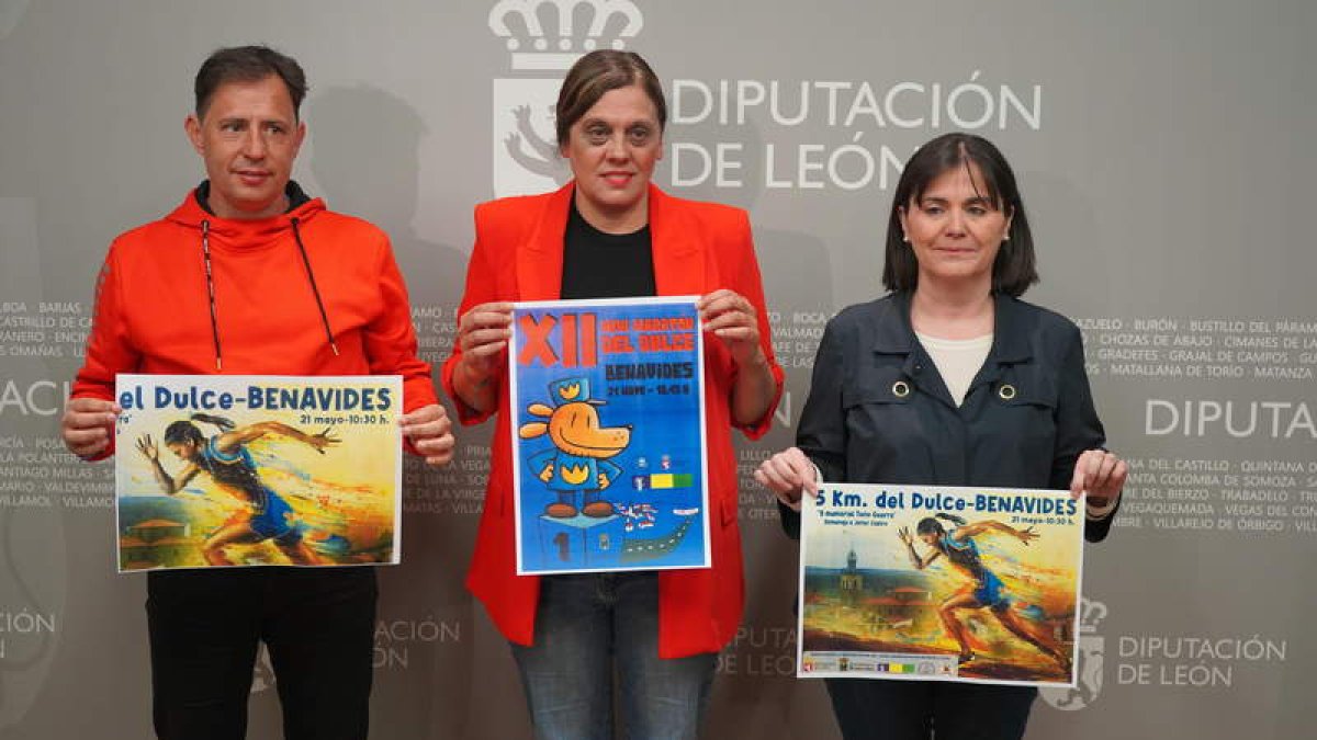 Roberto García, Susana Folla y Esperanza Marcos en la presentación de la carrera. J. NOTARIO