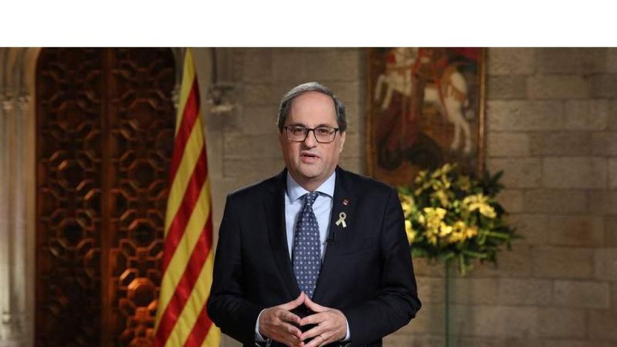El presidente catalán, Quim Torra, pronuncia el tradicional mensaje institucional de fin de año. JORDI BEDMAR PASCUAL