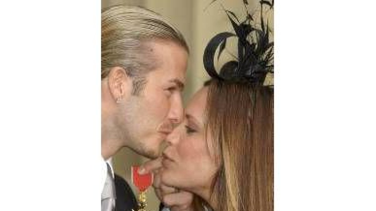Foto de la pareja en la entrega de la Medalla del Imperio Británico