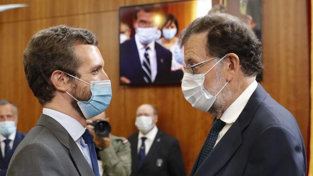 Pablo Casado y Mariano Rajoy. LAVANDEIRA