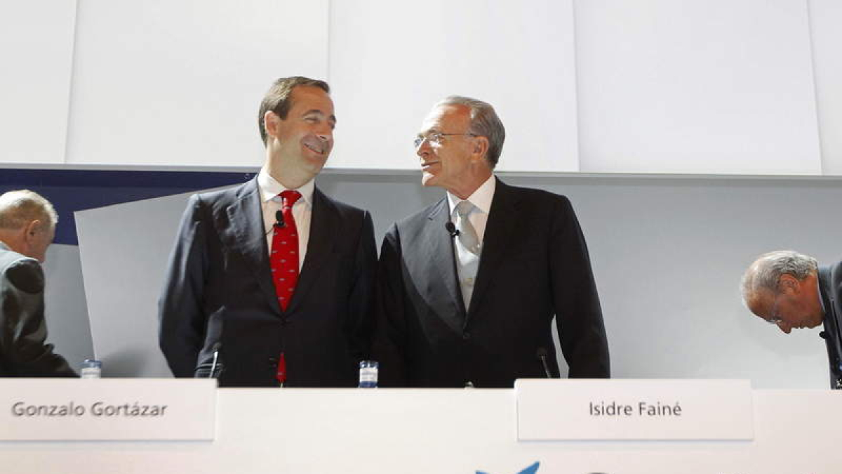 El consejero delegado, Gortázar, y el presidente, Fainé.