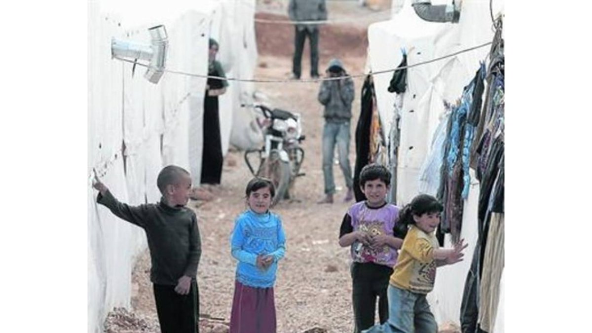 Niños sirios acogidos en el campamento en Arsal, en el valle de la Bekaa.