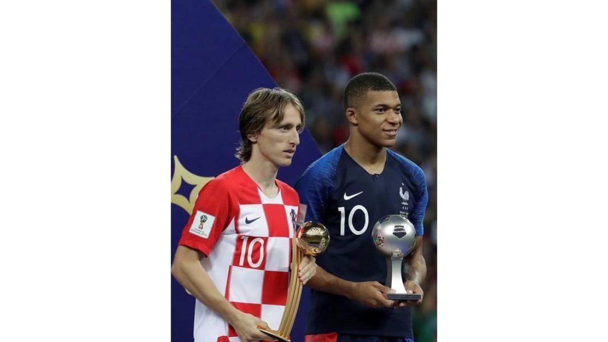 Modric y Mbappé.