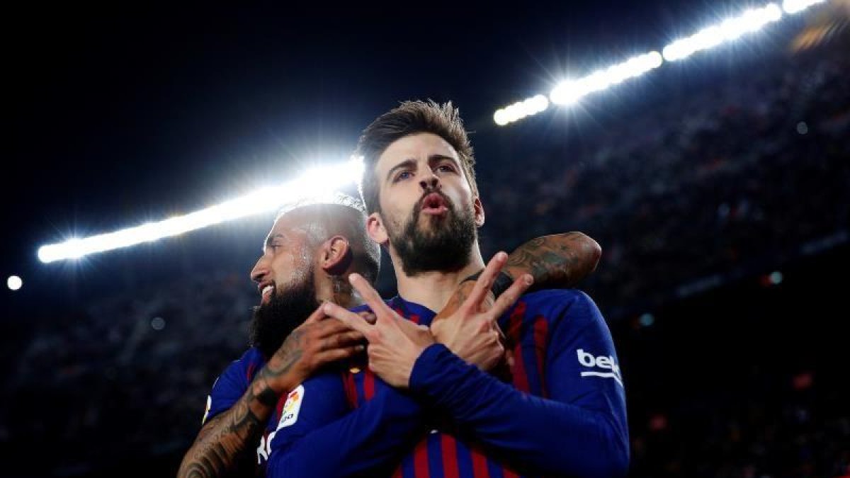 Piqué celebra el gol del empate.