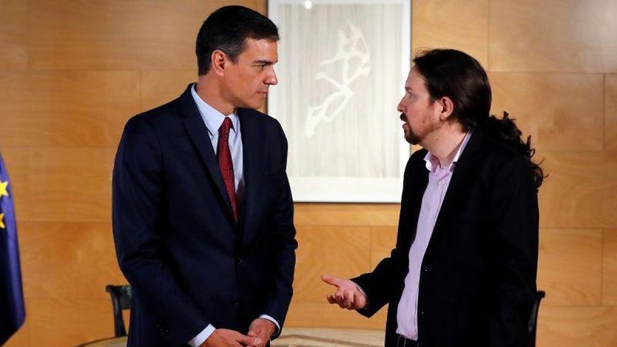 El presidente del Gobierno en funciones, Pedro Sánchez, y el líder de Unidas Podemos, Pablo Iglesias.