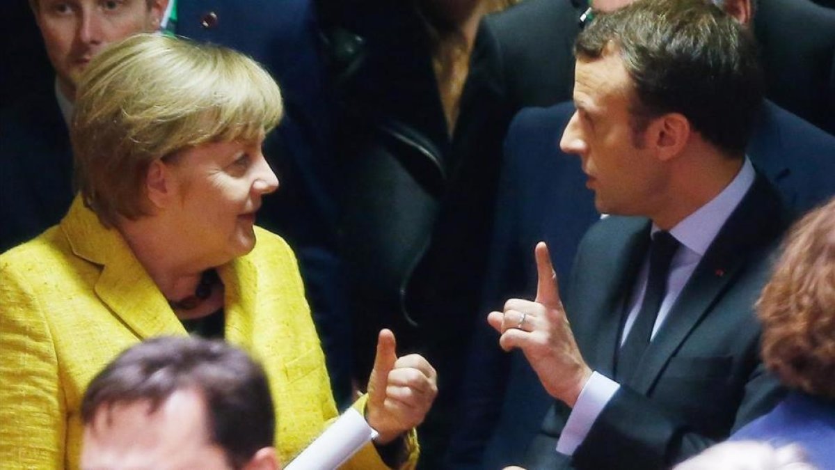 Merkel y Macron, en la cumbre europea en Bruselas.