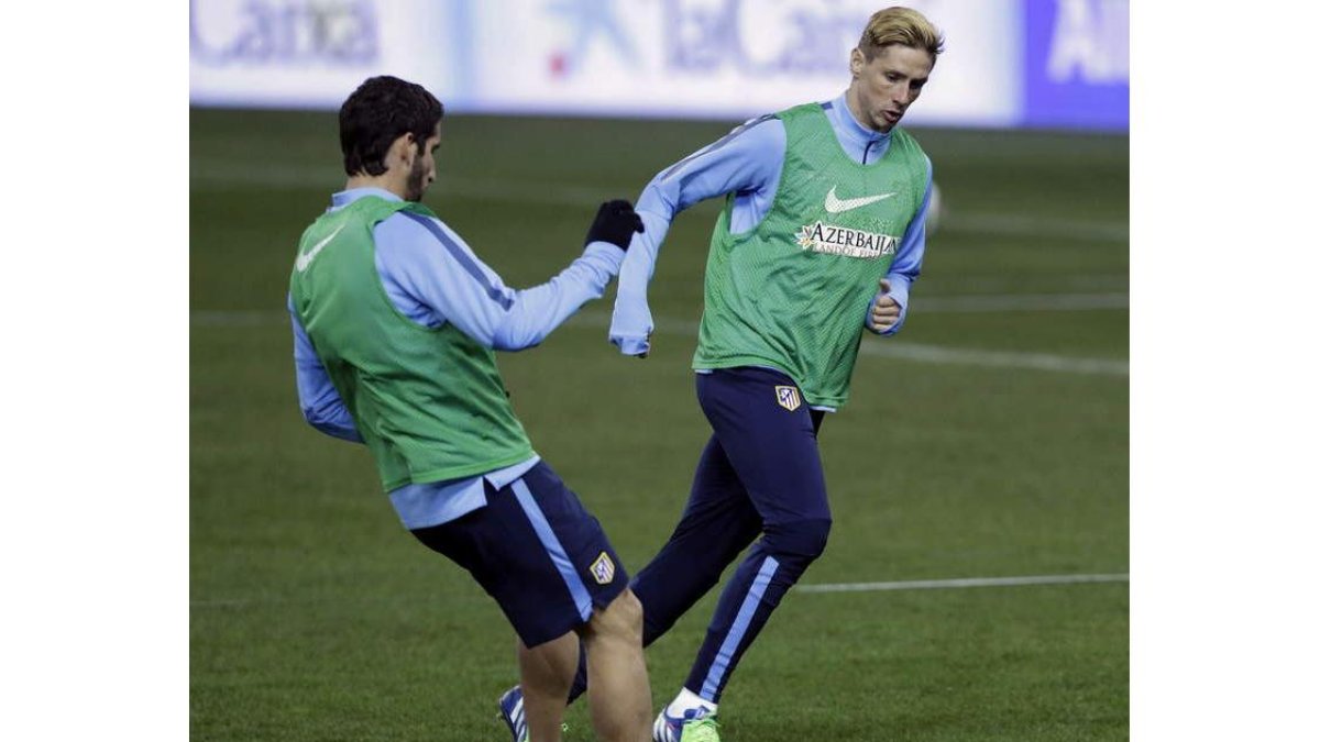 El delantero del Atlético Fernando Torres, en la última sesión de trabajo antes del partido de hoy.